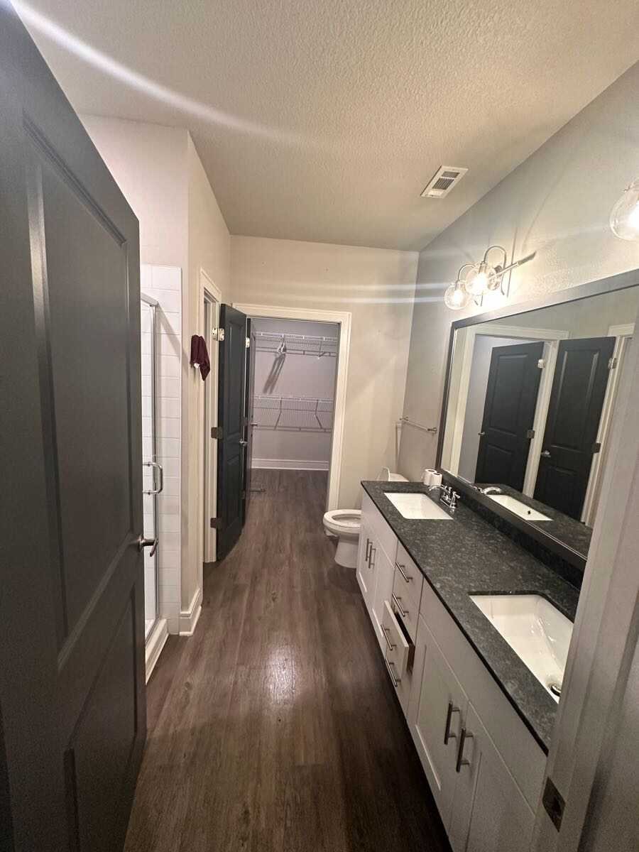 Clean dual-sink bathroom cleaned by Katherine's Cleaning Services in Charleston, SC